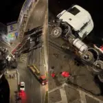 Motorista morre após carreta-cegonha tombar em avenida de Cariacica